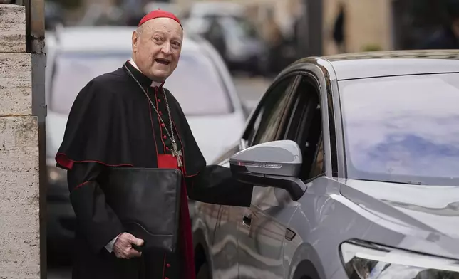 Cardinal Gianfranco Ravasi boards a vehicle at the Vatican, Thursday, April 24, 2025. (AP Photo/Andreea Alexandru)