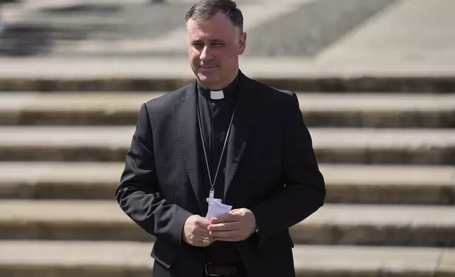 Cardinal Rolandas Makrickas arrives to the St. Mary Major Basilica, in Rome, Friday April 25, 2025. (AP Photo/Bernat Armangue)