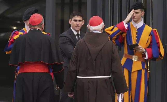 Cardinals arrive for a college of cardinals' meeting at the Vatican, Thursday, April 24, 2025. (AP Photo/Andrew Medichini)