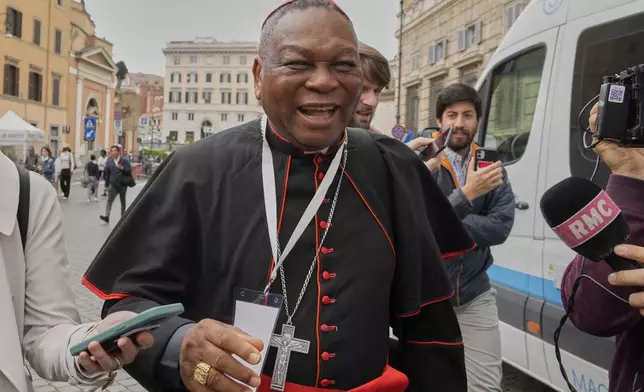 Cardinal John Olorunfemi Onaiyekan arrives for a college of cardinals' meeting, at the Vatican, Monday, April 28, 2025. (AP Photo/Gregorio Borgia)