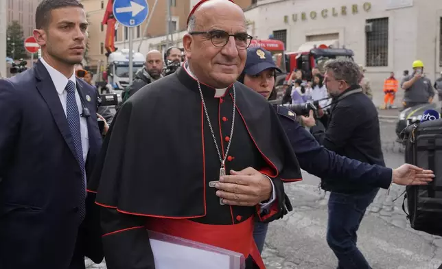 Cardinal Fernando Natalio Chomalí Garib arrives for a college of cardinals' meeting, at the Vatican, Friday, April 25, 2025. (AP Photo/Gregorio Borgia)