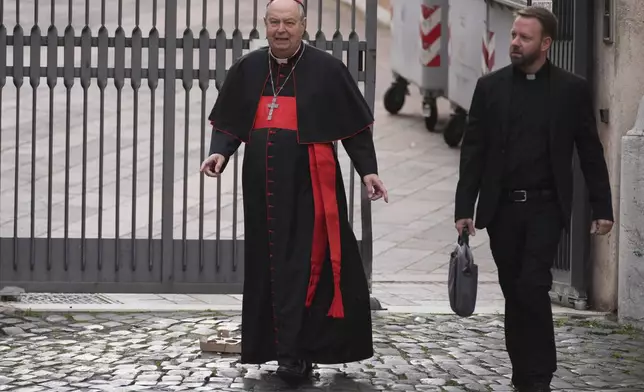 Cardinal Leonardo Sandri, center, arrives for a college of cardinals' meeting at the Vatican, Thursday, April 24, 2025. (AP Photo/Andrew Medichini)