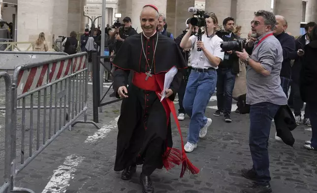 Cardinal Jean-Paul Vesco arrives for a college of cardinals' meeting at the Vatican, Thursday, April 24, 2025. (AP Photo/Andrew Medichini)