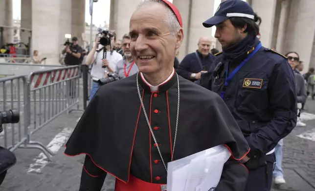 Cardinal Jean-Paul Vesco arrives for a college of cardinals' meeting at the Vatican, Thursday, April 24, 2025. (AP Photo/Andrew Medichini)