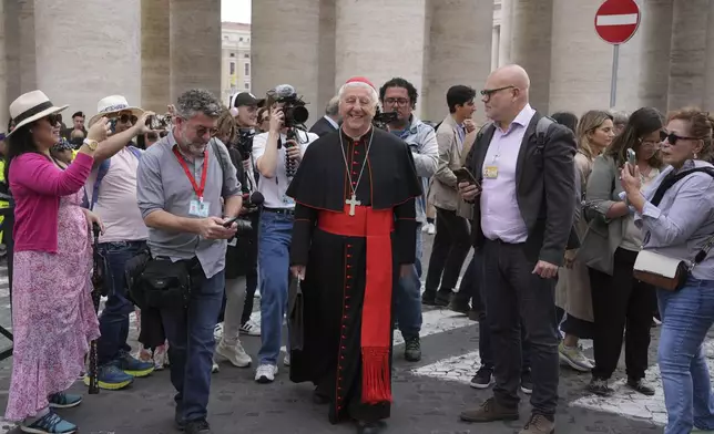 Cardinal Giuseppe Versaldi, center, arrives for a college of cardinals' meeting at the Vatican, Thursday, April 24, 2025. (AP Photo/Andrew Medichini)