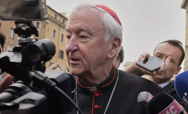British Cardinal Vincent Nichols is approached by reporters as he arrives for a college of cardinals' meeting, at the Vatican, Monday, April 28, 2025. (AP Photo/Gregorio Borgia)