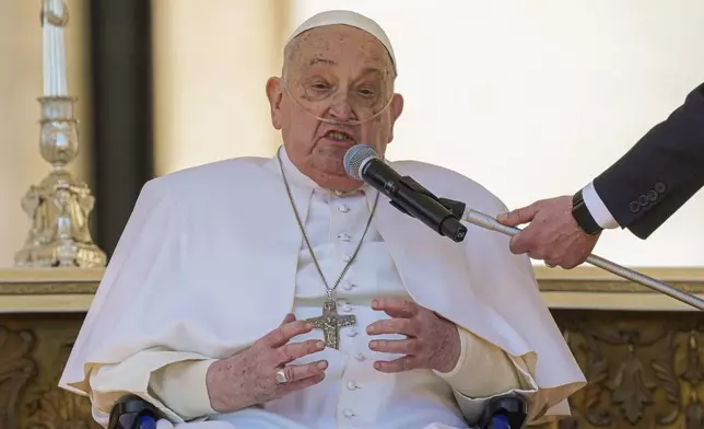 FILE - Pope Francis speaks to the faithful at the end of a mass in St. Peter's Square at The Vatican, Sunday, April 6, 2025, part of the jubilee of the sick and the health workers. (AP Photo/Andrew Medichini, File)