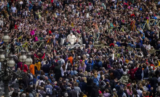FILE - Pope Francis leaves after celebrating the Palm Sunday's mass in St. Peter's Square at the Vatican April 2, 2023, a day after being discharged from the Agostino Gemelli University Hospital in Rome, where he has been treated for bronchitis. (AP Photo/Gregorio Borgia, File)