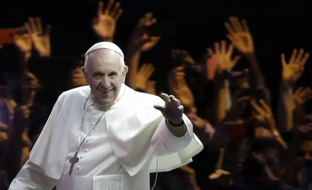 FILE - Pope Francis waves to the crowd during a procession, Saturday, Sept. 26, 2015, in Philadelphia. (AP Photo/Matt Rourke, Pool, File)