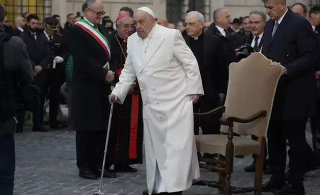 FILE - Pope Francis arrives for his annual Christmas visit to venerate a statue of the Virgin Mary near the Spanish Steps in Rome. Friday, Dec. 8, 2023. (AP Photo/Gregorio Borgia, File)