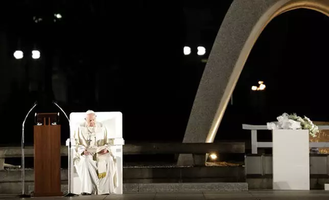 FILE - Pope Francis prepares to deliver a speech during a meeting at Hiroshima Peace Memorial Park in Hiroshima, western Japan, Sunday, Nov. 24, 2019. (AP Photo/Gregorio Borgia, file)
