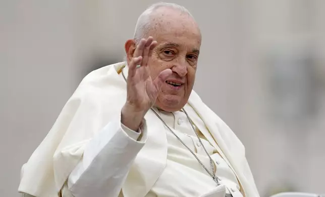 file - Pope Francis smiles after celebrating Easter mass in St. Peter's Square at the Vatican, Sunday, March 31, 2024. (AP Photo/Andrew Medichini, file)