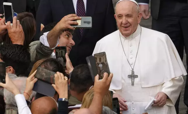 FILE - Pope Francis arrives for his weekly general audience with a limited number of faithful in the San Damaso Courtyard at the Vatican, Wednesday, June 2, 2021. (AP Photo/Andrew Medichini, file)