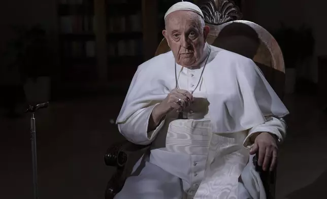 FILE - Pope Francis pauses during an interview with The Associated Press at The Vatican, Tuesday, Jan. 24, 2023. (AP Photo/Domenico Stinellis, File)