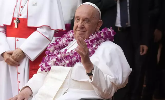 FILE - Pope Francis attends an interreligious meeting with young people at the Catholic Junior College in Singapore, Friday, Sept. 13, 2024. (AP Photo/Gregorio Borgia, file)
