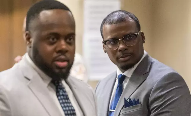 Former Memphis Police Department officers Tadarrius Bean and Justin Smith Jr. look towards the audience in a recess after attorneys argued motions before the state criminal trial for the death of Tyre Nichols at 201 Poplar in Memphis, Tenn., on Monday, April 28, 2025. (Chris Day/Commercial Appeal/USA Today Network, via AP, Pool)