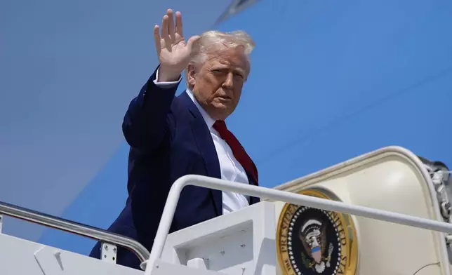 President Donald Trump waves as he boards Air Force One, Tuesday, April 29, 2025, at Joint Base Andrews, Md. (AP Photo/Alex Brandon)