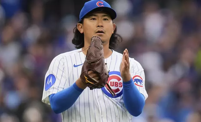 Chicago Cubs pitcher Shota Imanaga (18) applauds first baseman Justin Turner (3) as he gets San Diego Padres' Jake Cronenworth out at first during the seventh inning of a baseball game Friday, April 4, 2025, in Chicago. (AP Photo/Erin Hooley)