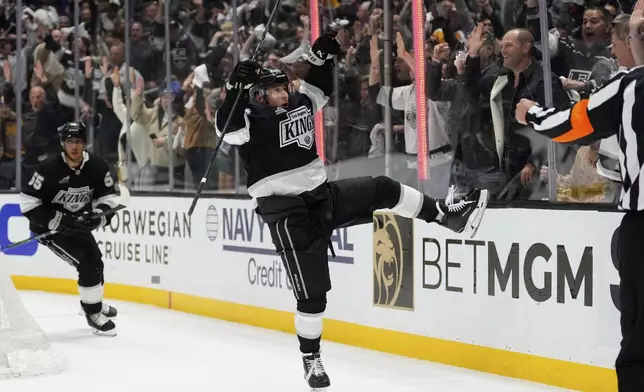 Los Angeles Kings left wing Andrei Kuzmenko celebrates his goal during the second period in Game 2 of an NHL hockey first-round playoff series against the Edmonton Oilers, Wednesday, April 23, 2025, in Los Angeles. (AP Photo/Mark J. Terrill)
