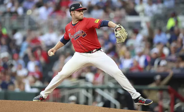 Atlanta Braves pitcher Bryce Elder (55) delivers in the first inning of a baseball game against the Minnesota Twins, Friday, April 18, 2025, in Atlanta. (AP Photo/Colin Hubbard)