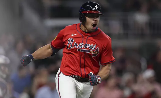 Atlanta Braves' Drake Baldwin reacts after hitting a game-winning pinch hit single in the eighth inning of a baseball game against the Minnesota Twins, Friday, April 18, 2025, in Atlanta. (AP Photo/Colin Hubbard)