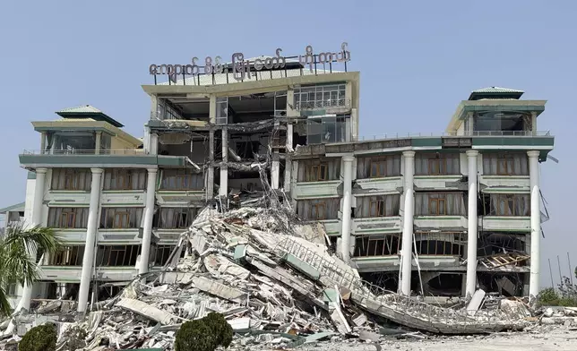 Rescuers work at damaged buildings in the aftermath of Friday's earthquake, in Naypyitaw, Myanmar, Wednesday, April 2, 2025. (AP Photo)