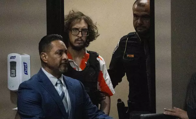 Patrick Crusius enters the Commissioners Courtroom at the Enrique Moreno County Courthosue for his sentencing in El Paso, Texas, April 21, 2025. (Omar Ornelas/Pool Photo via AP)