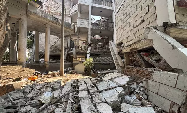A damaged building is seen in Naypyitaw, Myanmar, Monday, April 28, 2025, one month after the earthquake. (AP Photo/Aung Shine Oo)