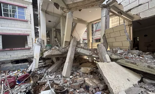 A damaged building is seen in Naypyitaw, Myanmar, Monday, April 28, 2025, one month after the earthquake. (AP Photo/Aung Shine Oo)