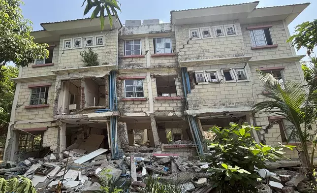 A damaged building is seen in Naypyitaw, Myanmar, Monday, April 28, 2025, one month after the earthquake. (AP Photo/Aung Shine Oo)
