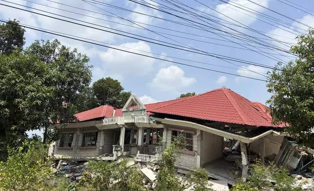 A damaged building is seen in Naypyitaw, Myanmar, Monday, April 28, 2025, one month after the earthquake. (AP Photo/Aung Shine Oo)