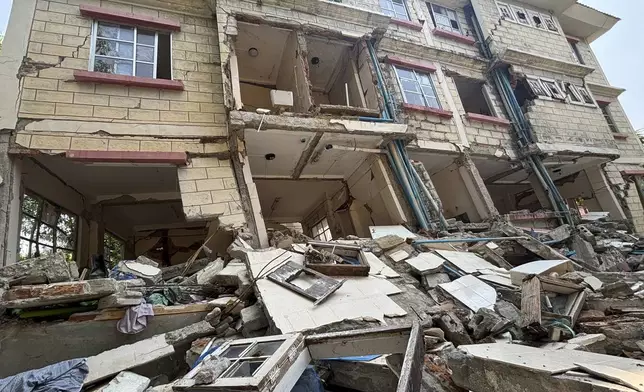 A damaged building is seen in Naypyitaw, Myanmar, Monday, April 28, 2025, one month after the earthquake. (AP Photo/Aung Shine Oo)