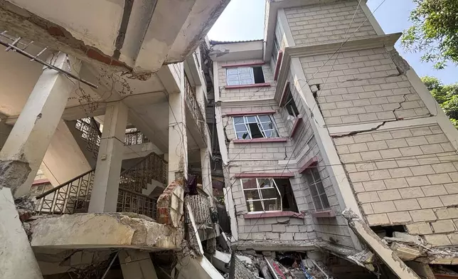 A damaged building is seen in Naypyitaw, Myanmar, Monday, April 28, 2025, one month after the earthquake. (AP Photo/Aung Shine Oo)