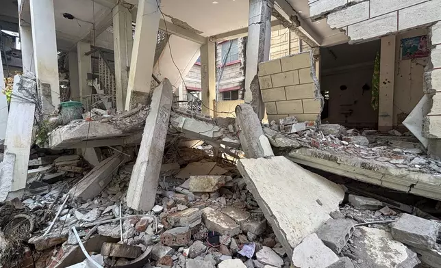 A damaged building is seen in Naypyitaw, Myanmar, Monday, April 28, 2025, one month after the earthquake. (AP Photo/Aung Shine Oo)