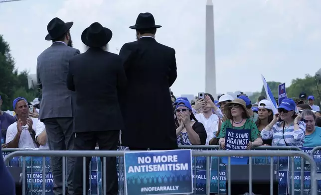 FILE - People attend the "NO FEAR: Rally in Solidarity with the Jewish People" event in Washington, Sunday, July 11, 2021, co-sponsored by the Alliance for Israel, Anti-Defamation League, American Jewish Committee, B'nai B'rith International and other organizations. (AP Photo/Susan Walsh, File)