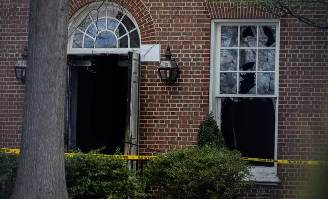 Police investigate Gov. Josh Shapiro's residence after someone set fire to the building on Sunday, April 13, 2025 in Harrisburg, Pa. (Sean Simmers/The Patriot-News via AP)
