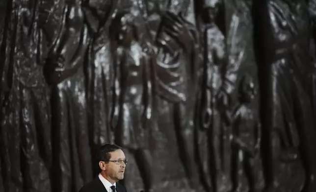 Israeli President Isaac Herzog speaks during the opening ceremony of the Holocaust Remembrance Day at the Yad Vashem Holocaust Memorial Museum in Jerusalem on Wednesday, April 23, 2025. (AP Photo/Leo Correa)