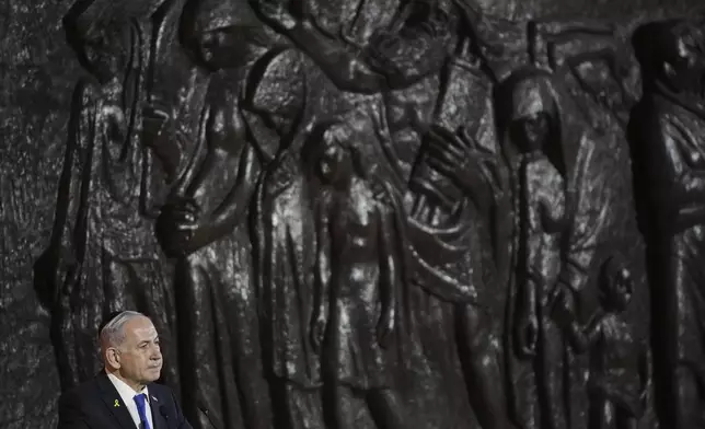 Israeli Prime Minister Benjamin Netanyahu speaks during the opening ceremony of the Holocaust Remembrance Day at the Yad Vashem Holocaust Memorial Museum in Jerusalem on Wednesday, April 23, 2025. (AP Photo/Leo Correa)