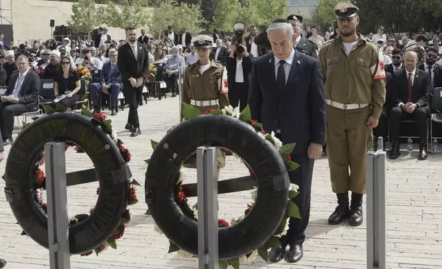 Israeli Prime Minister Benjamin Netanyahu lays a wreath at a ceremony marking the annual Holocaust Remembrance Day, at Yad Vashem Holocaust Memorial in Jerusalem, Thursday, April 24, 2025. (AP Maya Alleruzzo, Pool)