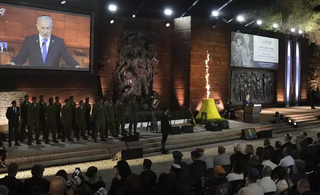 Israeli Prime Minister Benjamin Netanyahu speaks during the opening ceremony of the Holocaust Remembrance Day at the Yad Vashem Holocaust Memorial Museum in Jerusalem on Wednesday, April 23, 2025. (AP Photo/Leo Correa)