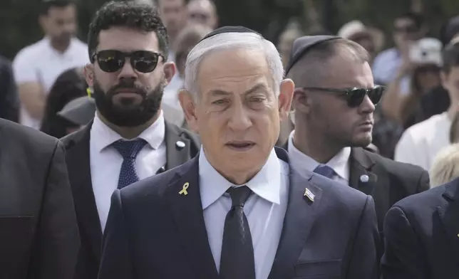 Israeli Prime Minister Benjamin Netanyahu attends a ceremony marking the annual Holocaust Remembrance Day, at Yad Vashem Holocaust Memorial in Jerusalem, Thursday, April 24, 2025. (AP Photo/Maya Alleruzzo, Pool)