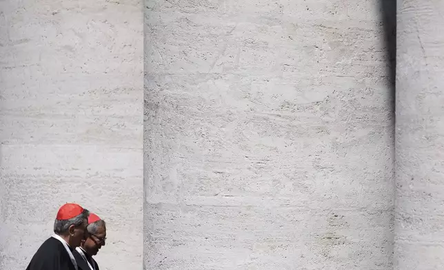 Colombian cardinals Luis José Rueda Aparicio, right, and Rubén Salazar Gómez leave at the end of a college of cardinals' meeting, at the Vatican, Tuesday, April 29, 2025. (AP Photo/Gregorio Borgia)