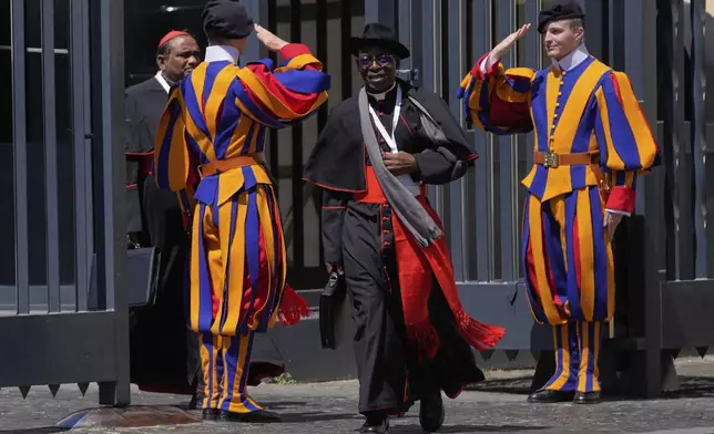 Cardinal Ignace Bessi Dogbo, of Ivory Coast, leaves at the end of a college of cardinals' meeting, at the Vatican, Tuesday, April 29, 2025. (AP Photo/Gregorio Borgia)
