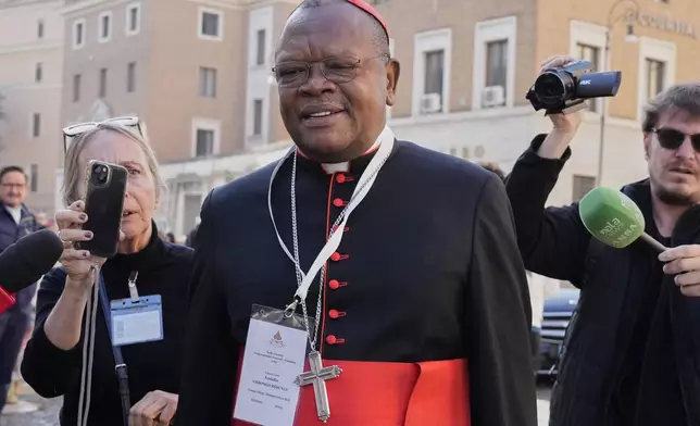 Cardinal Fridolin Ambongo Besungu arrives for a college of cardinals' meeting, at the Vatican, Wednesday, April 30, 2025. (AP Photo/Gregorio Borgia)