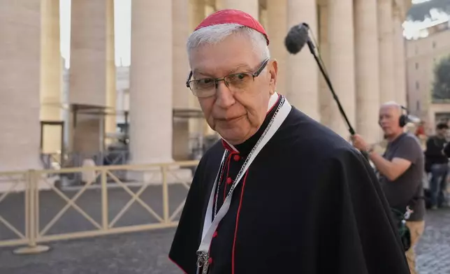 Cardinal Carlos Gustavo Castillo Mattasoglio, from Peru, arrives for a college of cardinals' meeting, at the Vatican, Wednesday, April 30, 2025. (AP Photo/Gregorio Borgia)