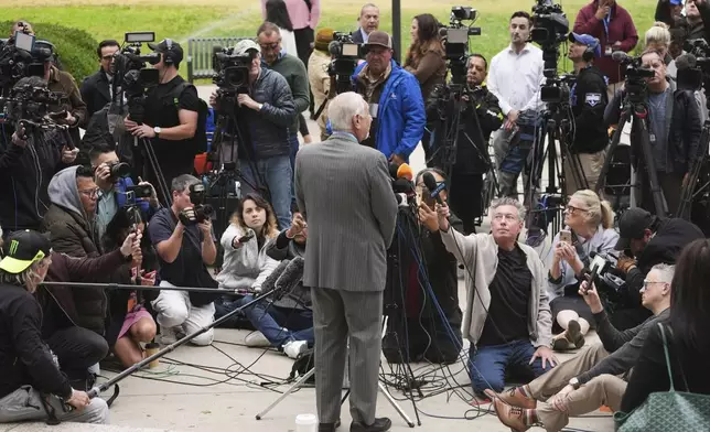 Attorney Mark Geragos, representing Erik and Lyle Menendez, speaks to the media as he arrives for a hearing in their case Thursday, April 17, 2025, in Los Angeles. (AP Photo/Damian Dovarganes)