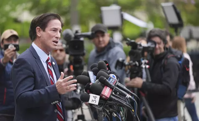 Los Angeles County District Attorney Nathan Hochman speaks outside of court before a hearing in the case of Erik and Lyle Menendez Thursday, April 17, 2025, in Los Angeles. (AP Photo/Damian Dovarganes)