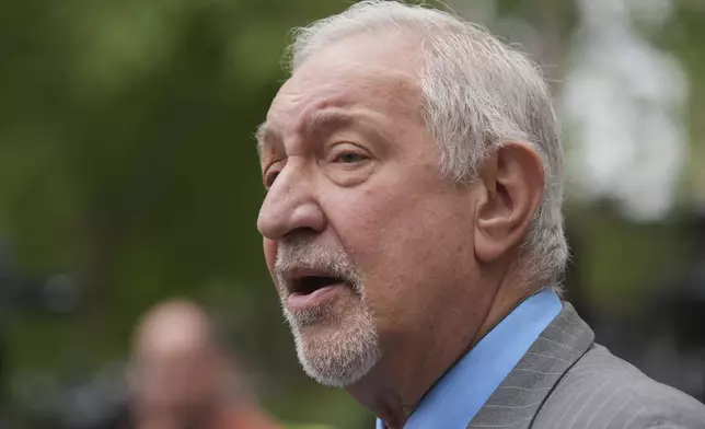Attorney Mark Geragos, representing Erik and Lyle Menendez, who were sentenced in 1996 to life in prison without the possibility of parole for fatally shooting their parents, speaks to the media outside of court after a resentencing hearing in their case, Thursday, April 17, 2025, in Los Angeles. (AP Photo/Damian Dovarganes)
