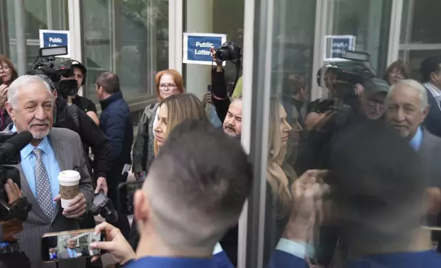 Attorney Mark Geragos, representing Erik and Lyle Menendez, arrives for a hearing in their case Thursday, April 17, 2025, in Los Angeles. (AP Photo/Damian Dovarganes)