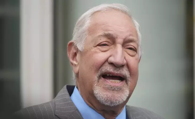 Attorney Mark Geragos, representing Erik and Lyle Menendez, speaks to the media as he arrives for a hearing in their case Thursday, April 17, 2025, in Los Angeles. (AP Photo/Damian Dovarganes)